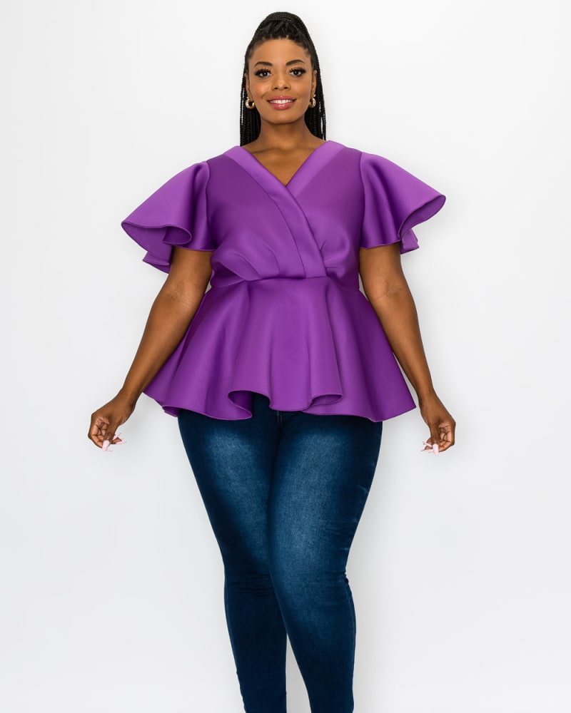 Front of a model wearing a size 1X Siobhan Peplum Top in Orchid by L I V D. | dia_product_style_image_id:241107